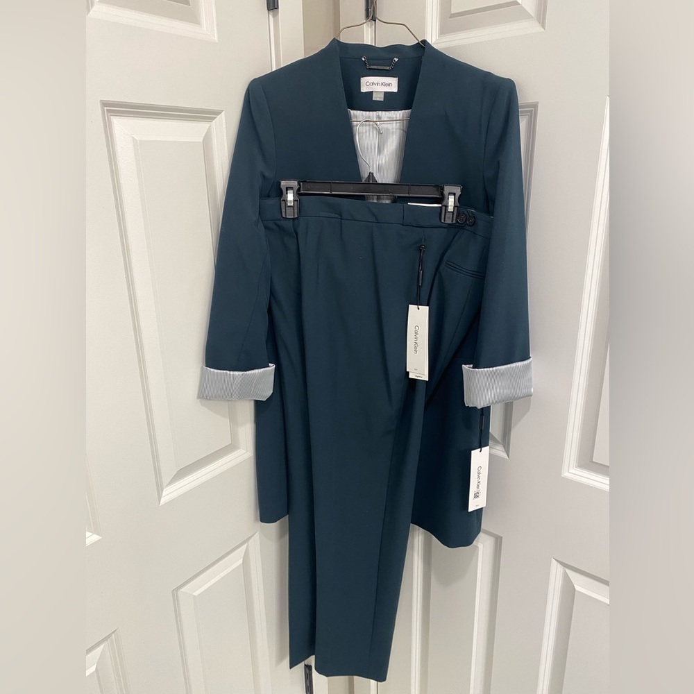 Calvin Klein women’s Teal Suit ( Brand new with tag )